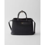 Prada Buckle medium leather handbag with double belt